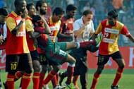 Syed Rahim Nabi being carried out after he was injured